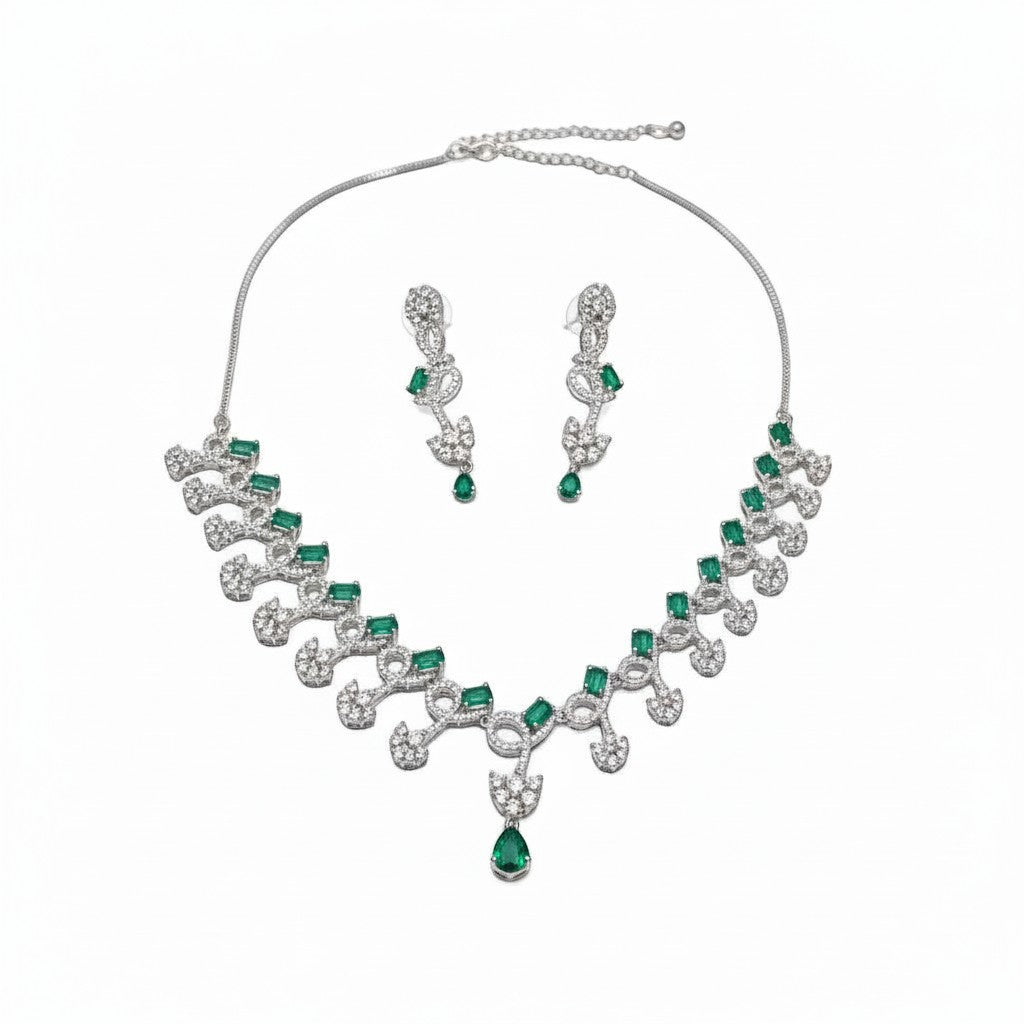 AVIRI emerald and crystal necklace and earring set with silver-tone metal, featuring emerald-cut green stones and clear crystals.
