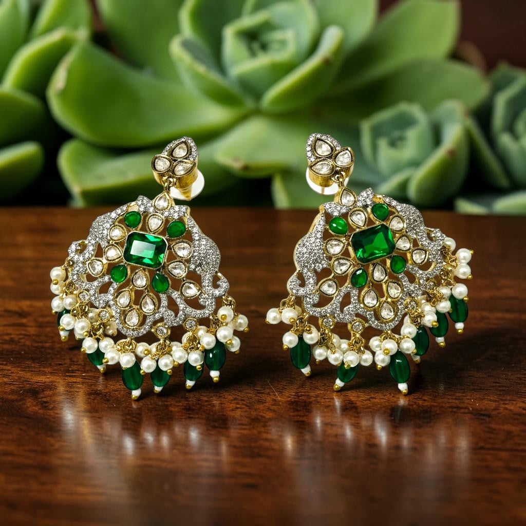 AVIRI statement earrings with emeralds, pearls, and white stones. Intricate gold-tone metalwork.