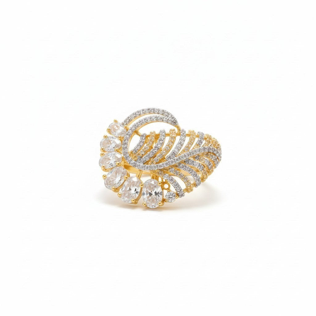AVIRI gold-tone cocktail ring with cubic zirconia stones in a peacock feather leaf design. Adjustable.