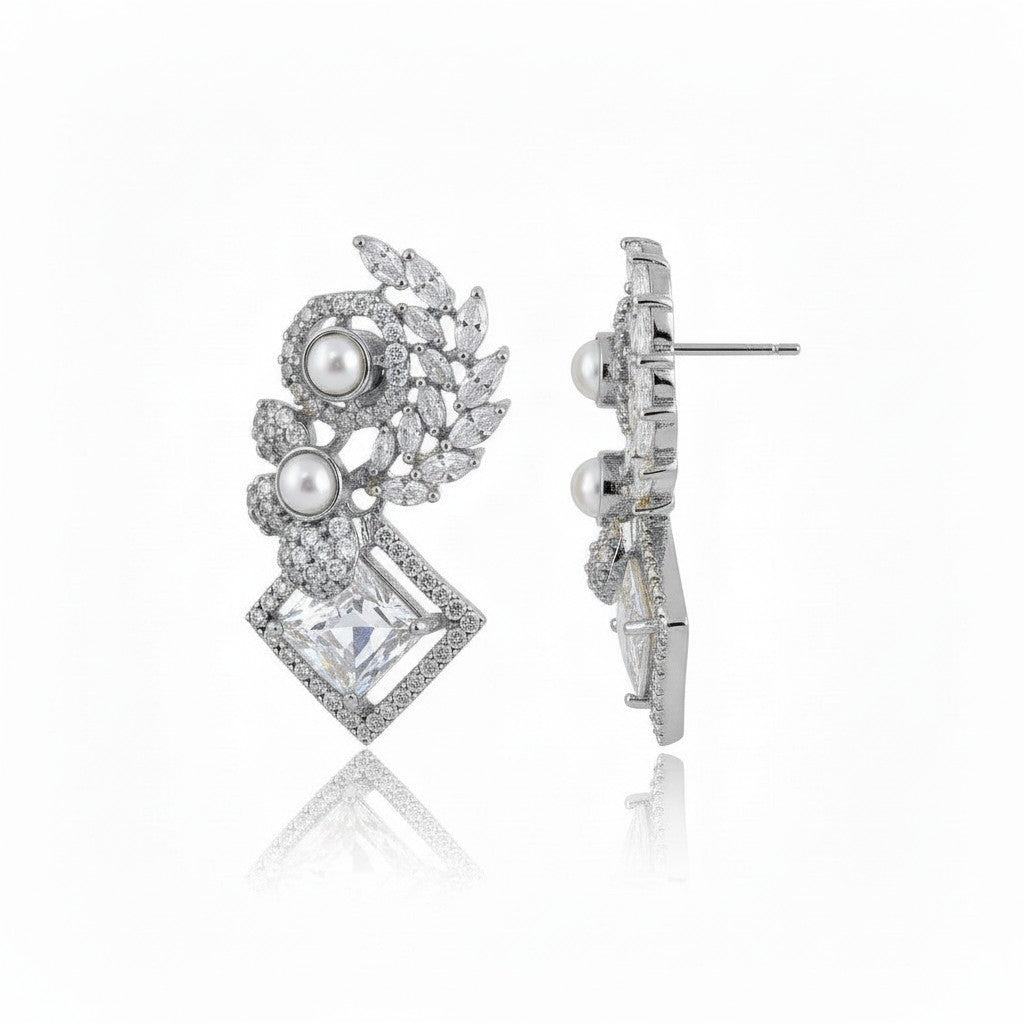 AVIRI elegant gold drop earrings with pearls, cubic zirconia, and geometric leaf design.