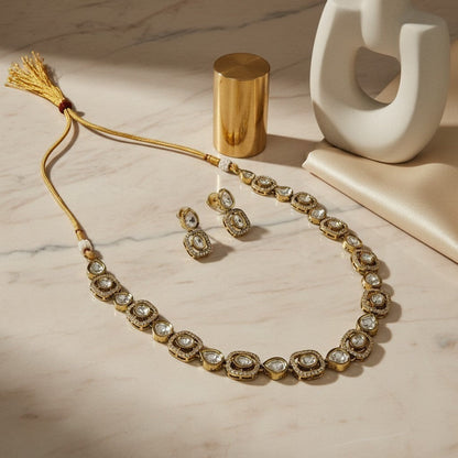 AVIRI American Diamond Necklace and Earring Set with gold-tone chain and clear stones in round and oval settings.