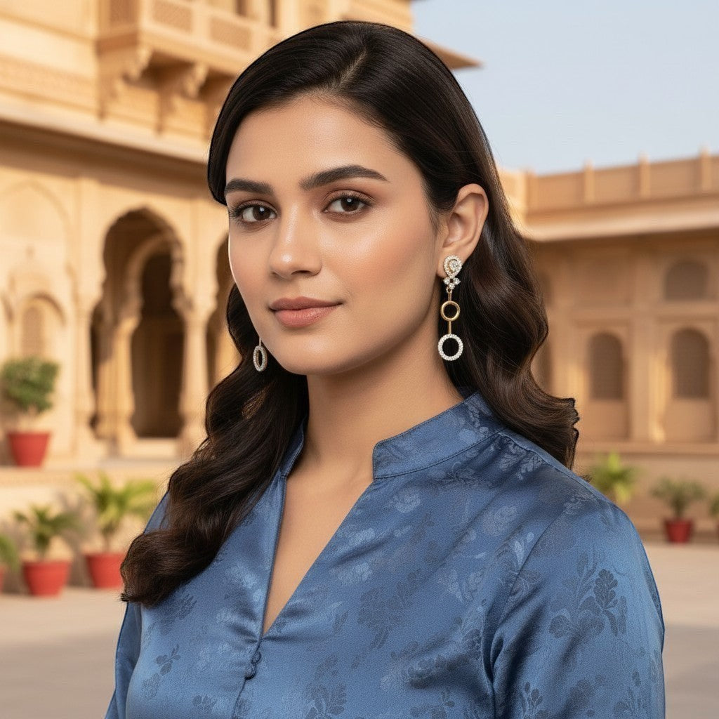 AVIRI designer gold and silver finish AD drop earrings with circular design and clear stones. Lightweight artificial jewelry.