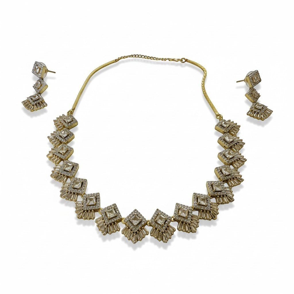 AVIRI necklace and earring set with square and baguette-cut cubic zirconia stones in silver-tone metal.