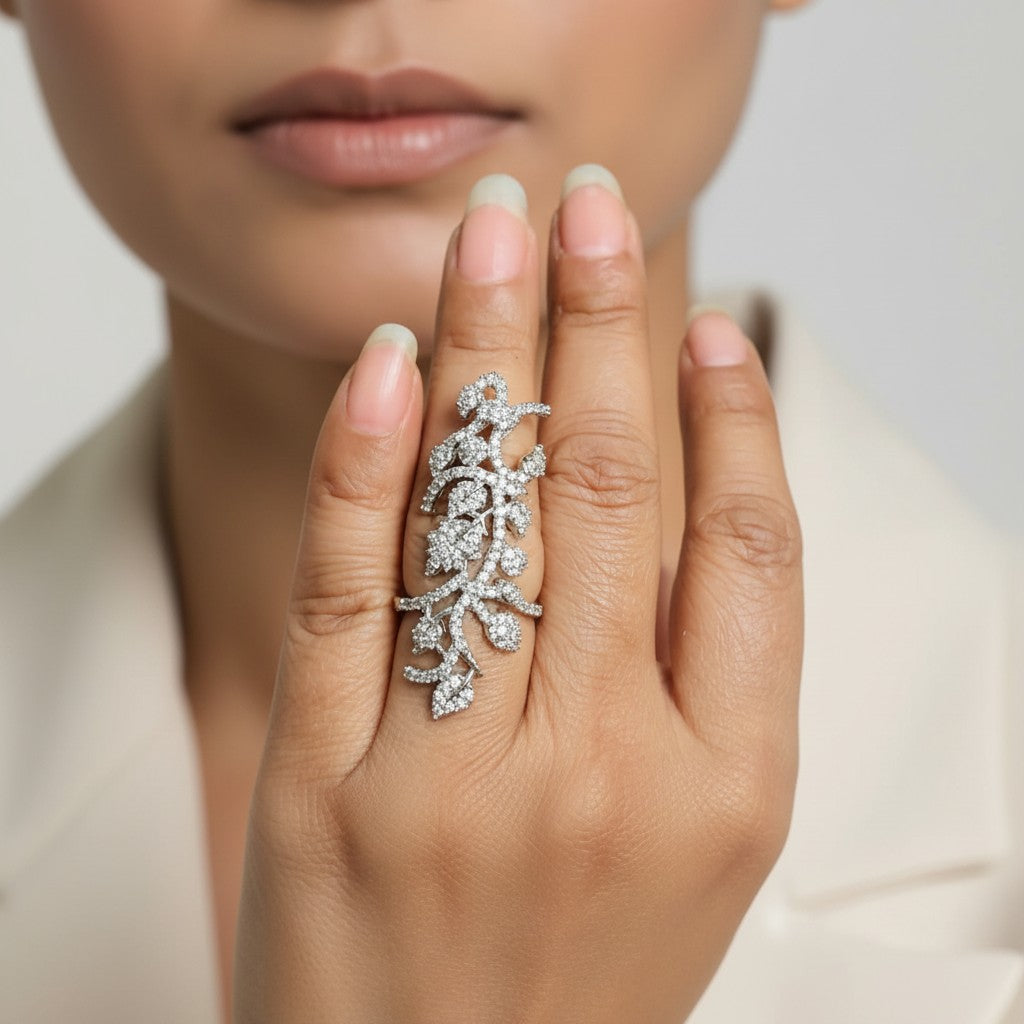 AVIRI sterling silver statement ring with cubic zirconia in a diamond leaf vine design. Open cuff.