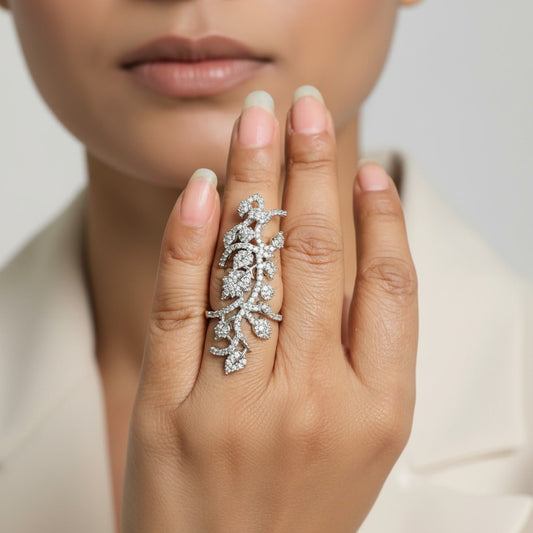AVIRI sterling silver statement ring with cubic zirconia in a diamond leaf vine design. Open cuff.