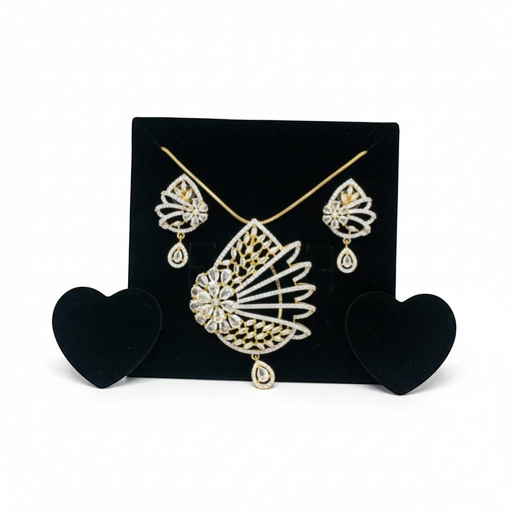 AVIRI dual-tone AD necklace set with matching earrings, featuring intricate floral and fan designs with sparkling stones.