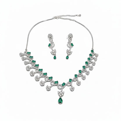 AVIRI emerald and crystal necklace and earring set with silver-tone metal, featuring emerald-cut green stones and clear crystals.