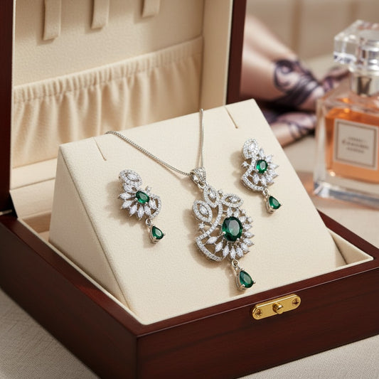 AVIRI emerald green gemstone pendant necklace and earring set with cubic zirconia in silver-tone metal.