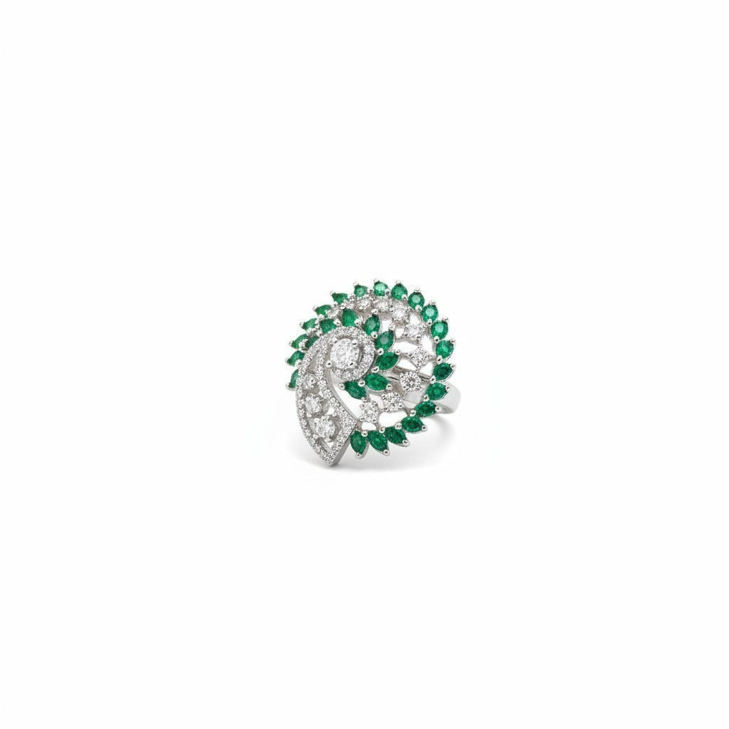 AVIRI emerald green swirling leaf statement ring with cubic zirconia stones and sterling silver.