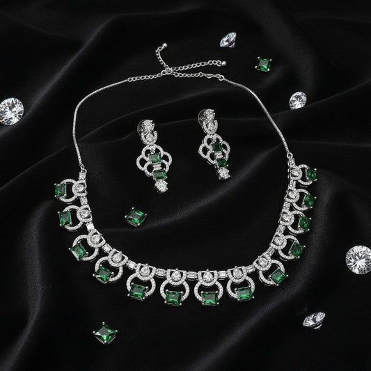 AVIRI elegant emerald necklace set with clear cubic zirconia accents in silver-tone metal. Matching earrings included.