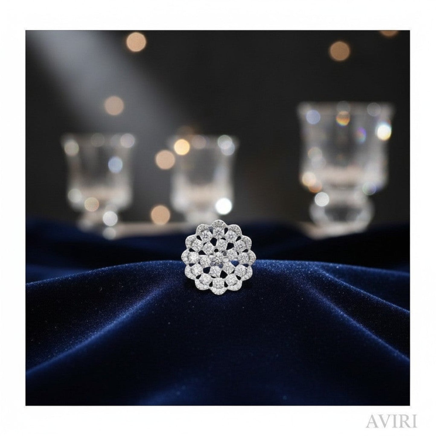 AVIRI silver polished floral statement ring with multiple American Diamonds in a cluster design.