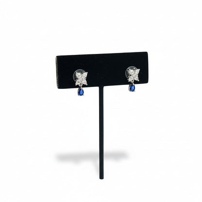 AVIRI floral drop earrings with pear shaped blue gemstones and cubic zirconia in silver-tone metal.