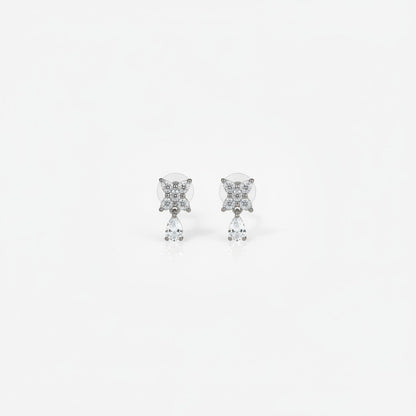 AVIRI floral drop earrings with pear shaped blue gemstones and cubic zirconia in silver-tone metal.