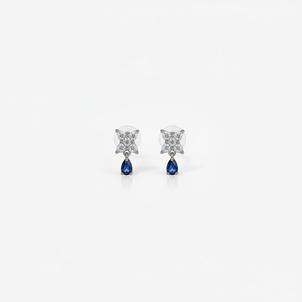 AVIRI floral drop earrings with pear-shaped blue gemstones and cubic zirconia in silver-tone metal.