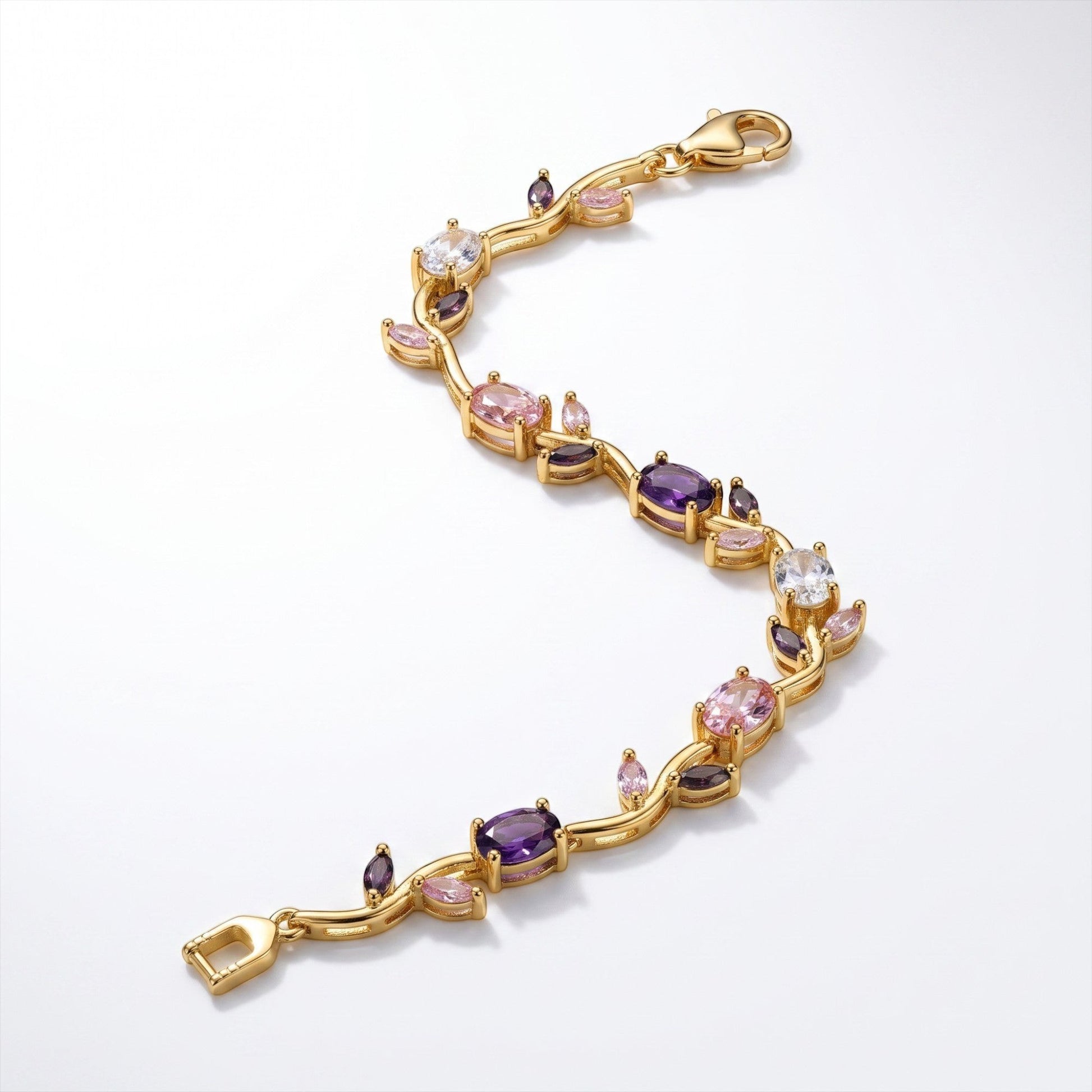 AVIRI floral-inspired gold-tone link bracelet with amethyst, blush pink, and clear gemstone marquise and oval stones.