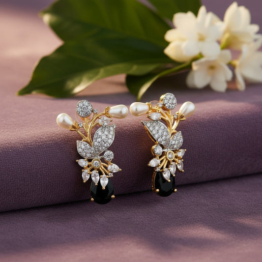 AVIRI gold-tone floral earrings with pearls, cubic zirconia, and black onyx gemstones.