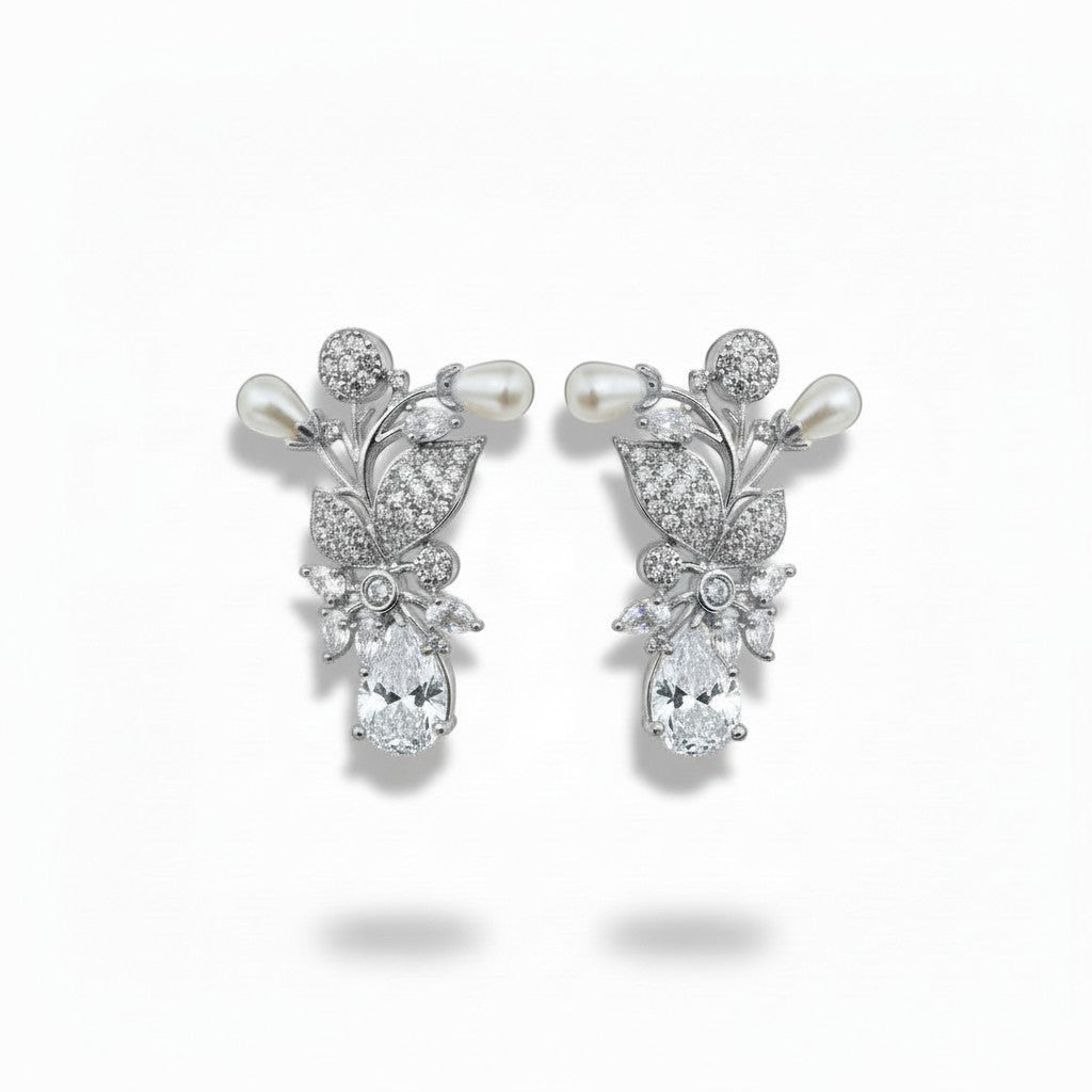 AVIRI gold and silver floral earrings with pearls, cubic zirconia, and pear-cut gemstones.