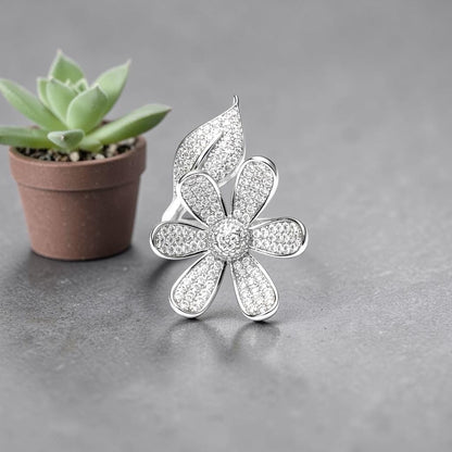 AVIRI sterling silver ring with flower and leaf design, encrusted with cubic zirconia stones.