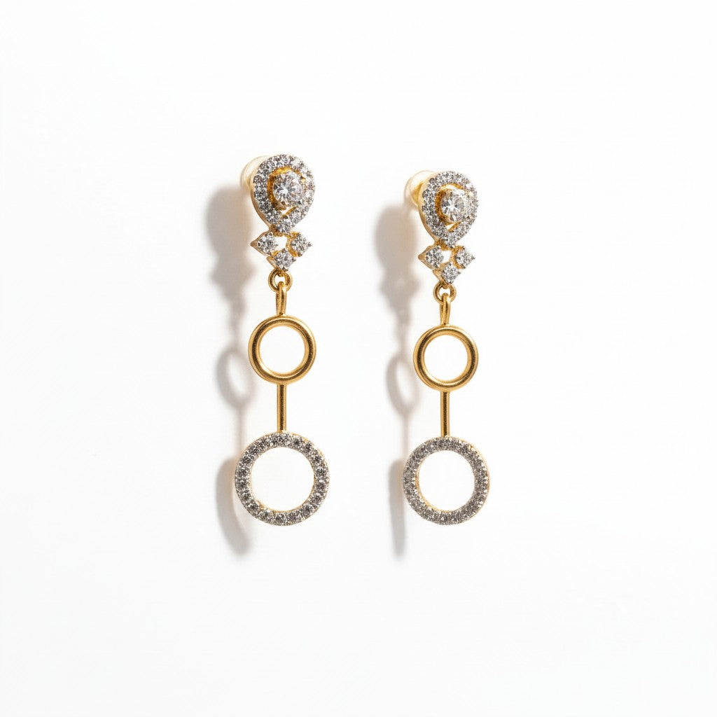 AVIRI gold finish drop earrings with layered circles and clear AD stones. Geometric design.