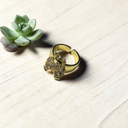 AVIRI gold-tone adjustable ring with a detailed bee design encrusted with cubic zirconia stones.