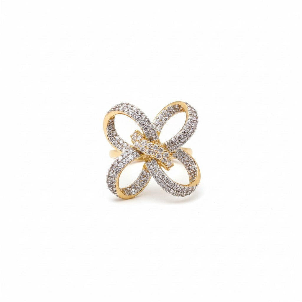 AVIRI gold bow ring with cubic zirconia. Statement ring with intricate openwork wings.
