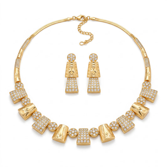 AVIRI gold-tone statement necklace and drop earring set with geometric textured links and sparkling crystal accents.