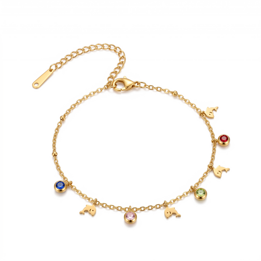 AVIRI gold-tone anklet featuring delicate chain with miniature dolphin charms and multi-coloured crystal accents.