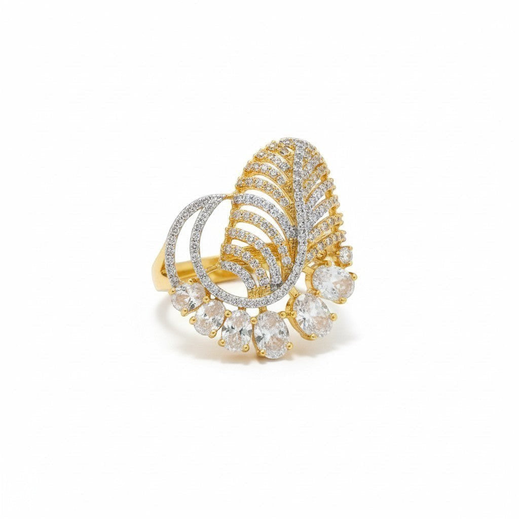 AVIRI gold-tone statement ring with leaf design and cubic zirconia stones. Adjustable cocktail ring.