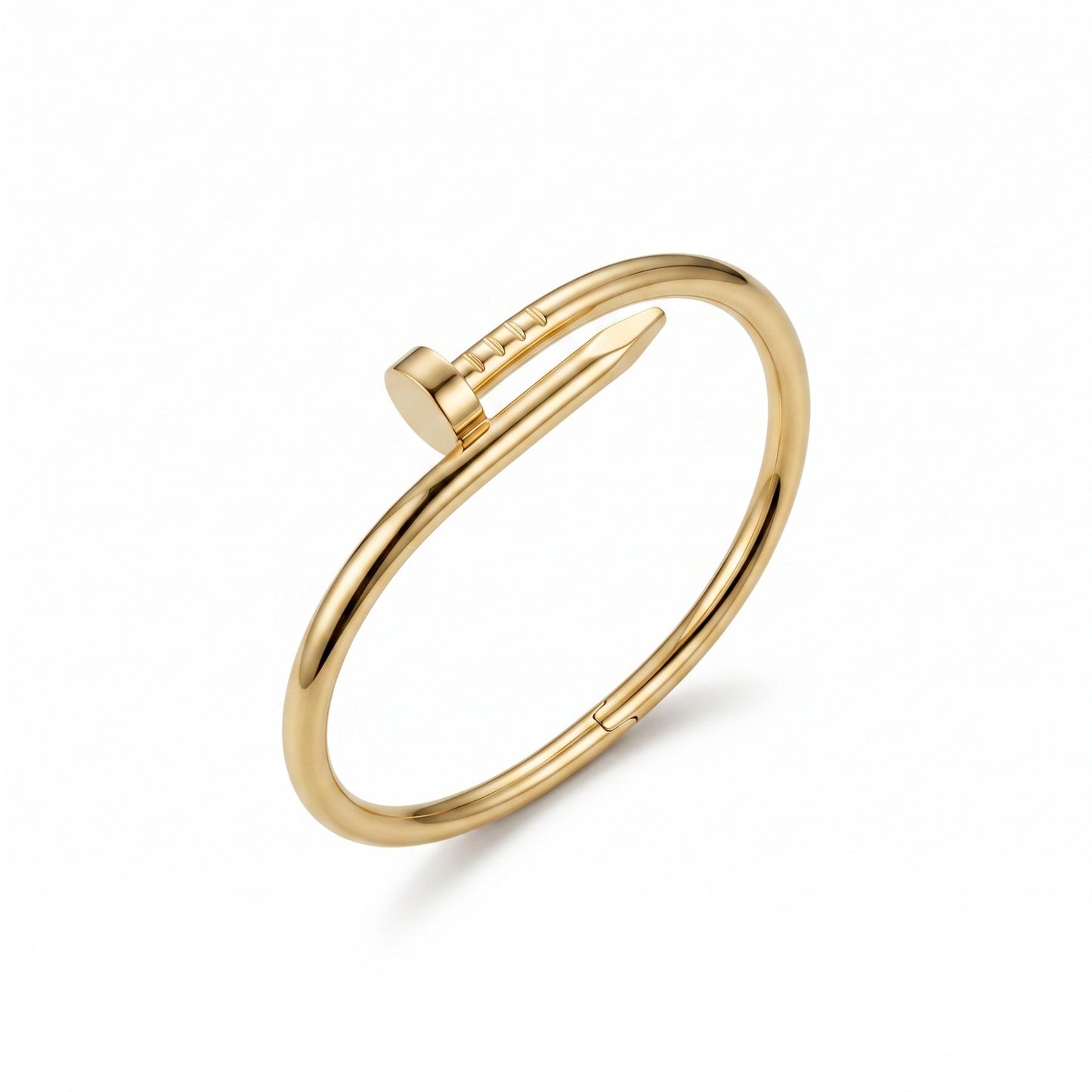 AVIRI gold-tone minimalist nail bangle bracelet with a polished finish and hinged closure on a white background.