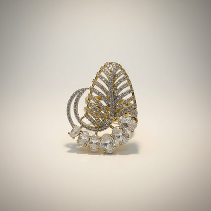 AVIRI gold-plated statement ring with leaf design and American diamonds. Features oval-cut stones.
