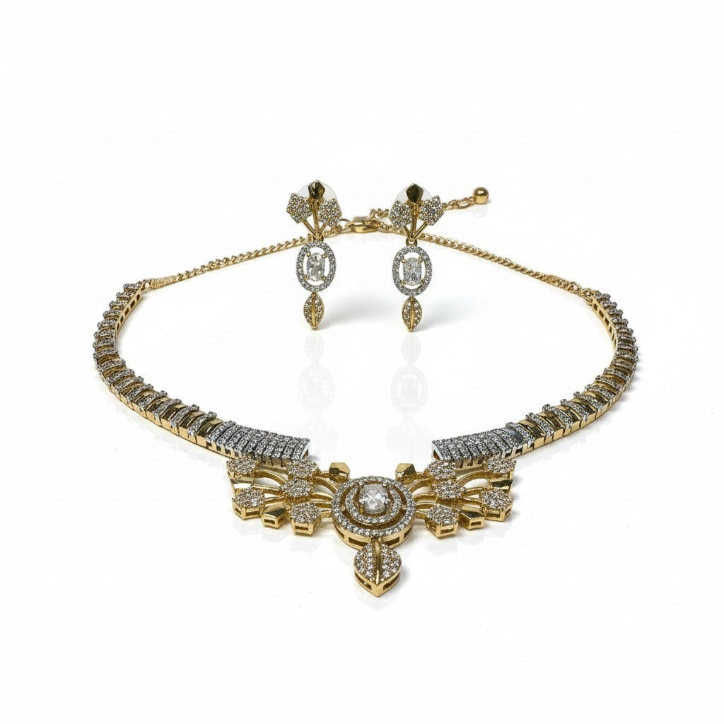 AVIRI gold-plated necklace and earring set with cubic zirconia stones and leaf motifs.