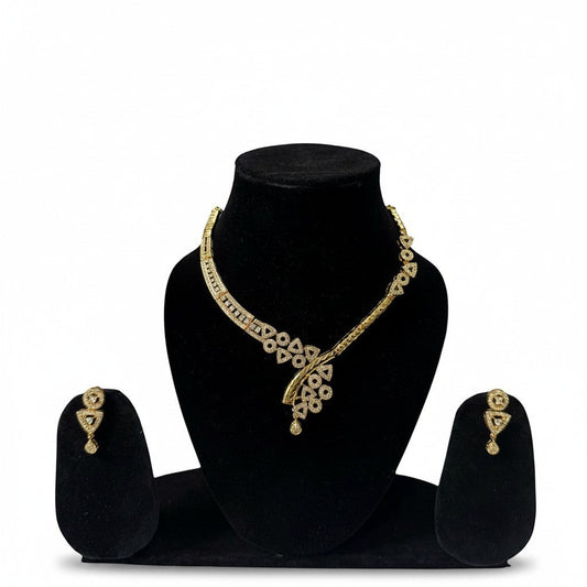 AVIRI gold-plated necklace and earring set with cubic zirconia stones. Geometric patterns and teardrop pendant.