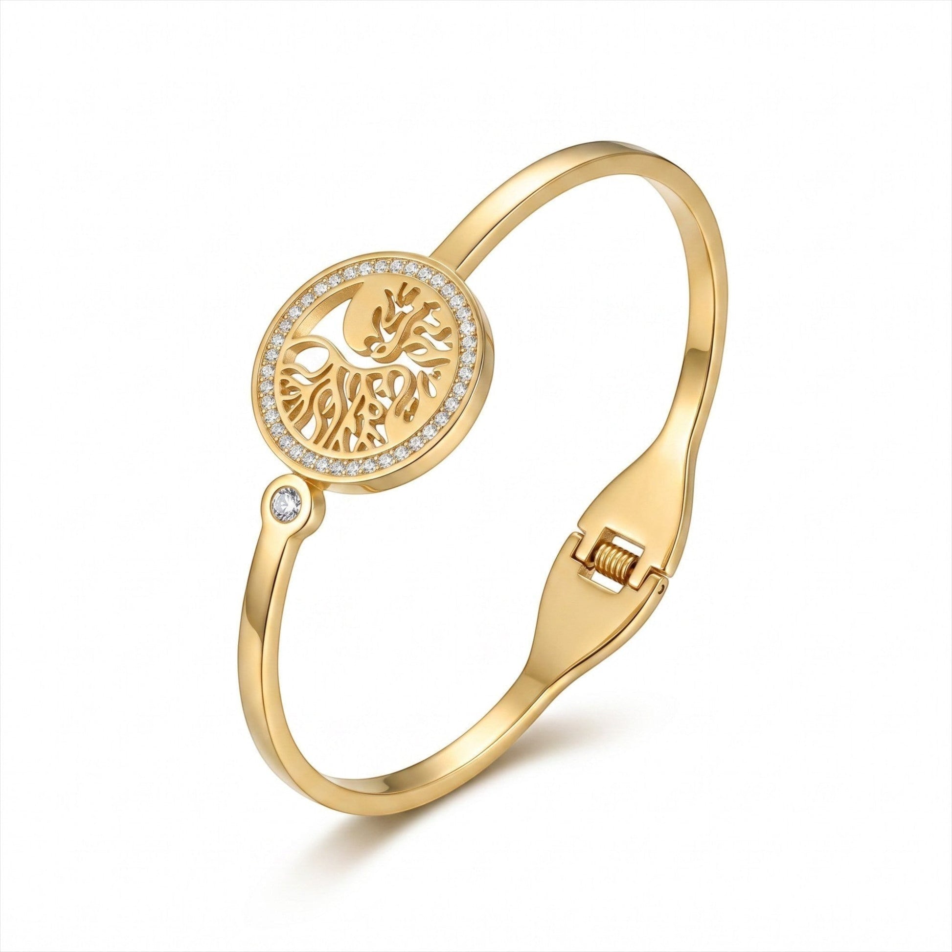 AVIRI gold-tone hinged bangle bracelet featuring a circular Tree of Life cutout design with cubic zirconia accents.