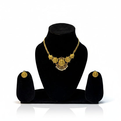 AVIRI gold-plated Indian necklace and earring set with deity motif, coin charms, and pearl drops.