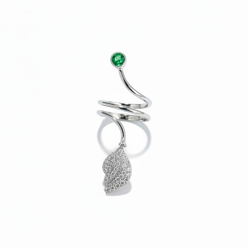 AVIRI sterling silver bypass ring with leaf motif, cubic zirconia, and green gemstone.