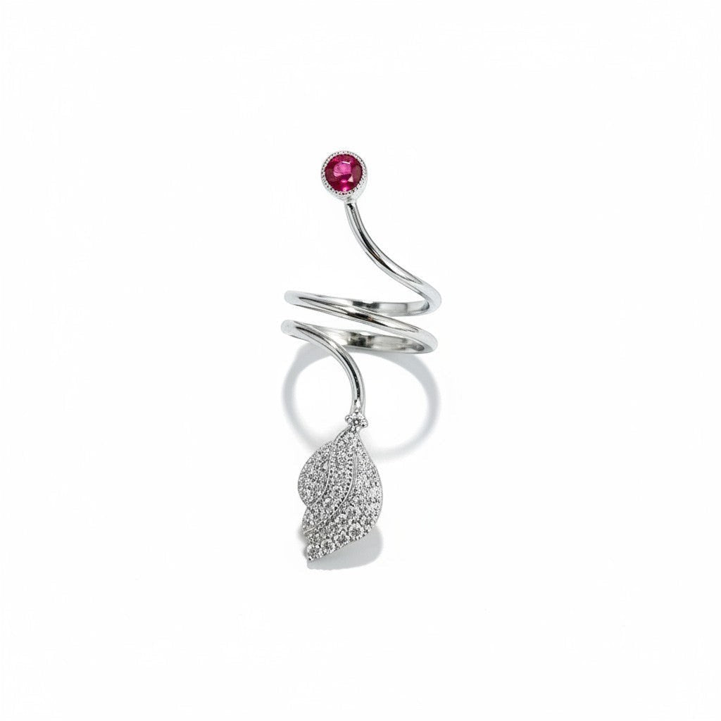 AVIRI sterling silver bypass ring with leaf motif, cubic zirconia, and a round red gemstone.
