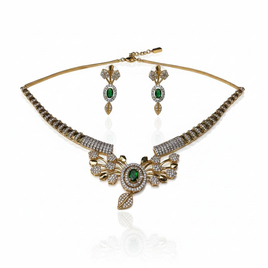 AVIRI ornate gold-plated necklace and earring set with green cubic zirconia and leaf motifs.