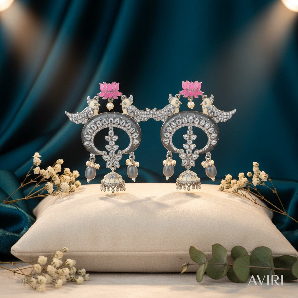 AVIRI oxidised silver chandbali earrings with pink lotus, birds, AD stones, and grey jhumka drops.