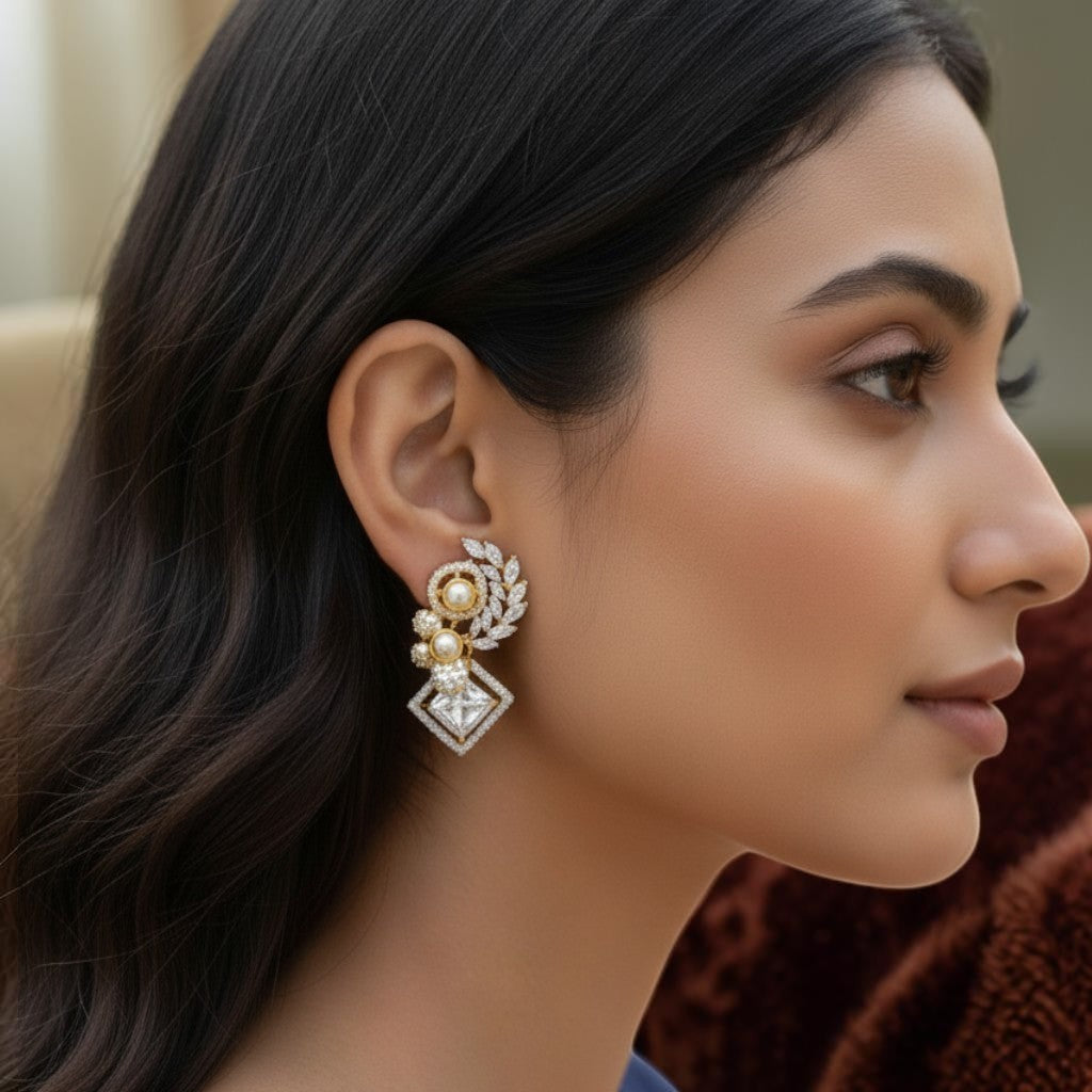 AVIRI elegant sterling silver drop earrings with pearls, cubic zirconia, leaf motifs and blue enamel accents.