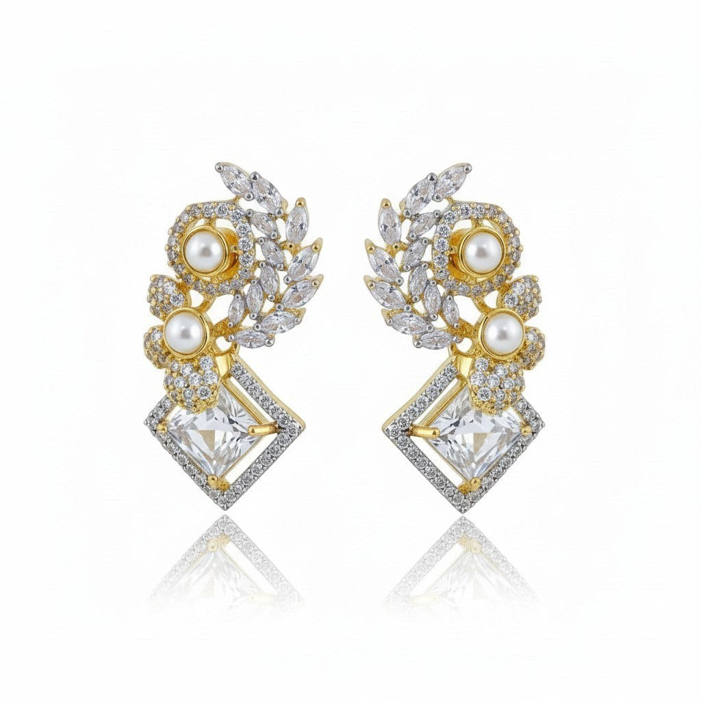 AVIRI elegant drop earrings with pearls, cubic zirconia, and leaf motifs. Sterling silver with blue enamel accents.