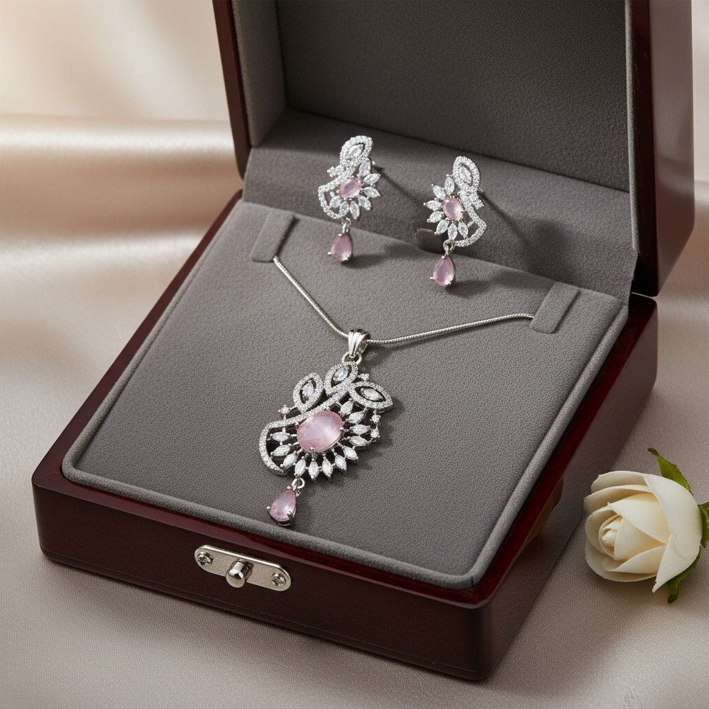AVIRI rose-pink gemstone pendant necklace and earrings set with cubic zirconia in silver-tone metal.