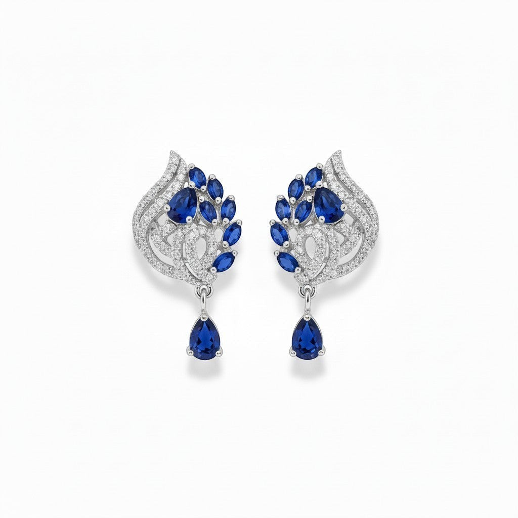 AVIRI sapphire blue leaf-shaped drop earrings with cubic zirconia and pear-shaped gemstone.