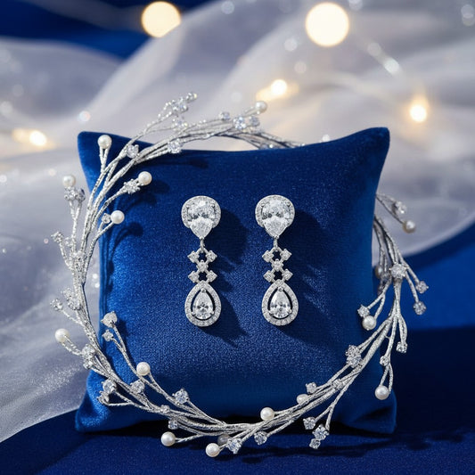 AVIRI silver polished drop earrings with teardrop American diamonds, perfect for special occasions.