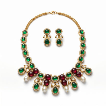 AVIRI traditional necklace and earring set featuring green and red cabochon stones, faux pearls, and gold metalwork.