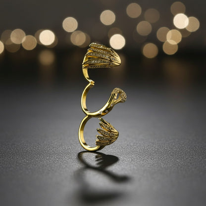 AVIRI gold-tone metal swan and wings ring set with clear crystals. Unique statement jewelry.